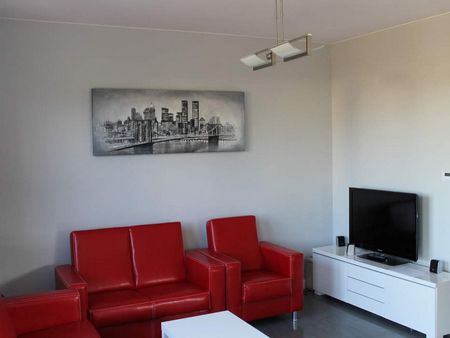 obraz grzewczy 900W - zamontowany nad sofą